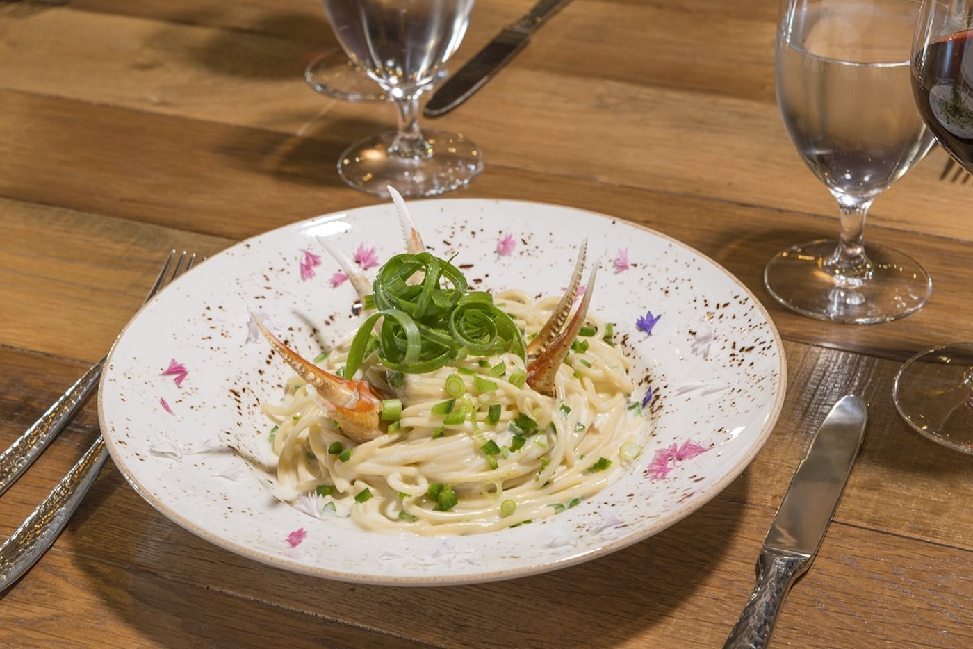 Lorem ipsum A creamy pasta dish prepared at Cello Restaurant