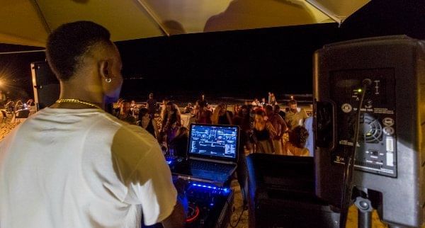 DJ Snoopi performing at The Somerset On Grace Bay