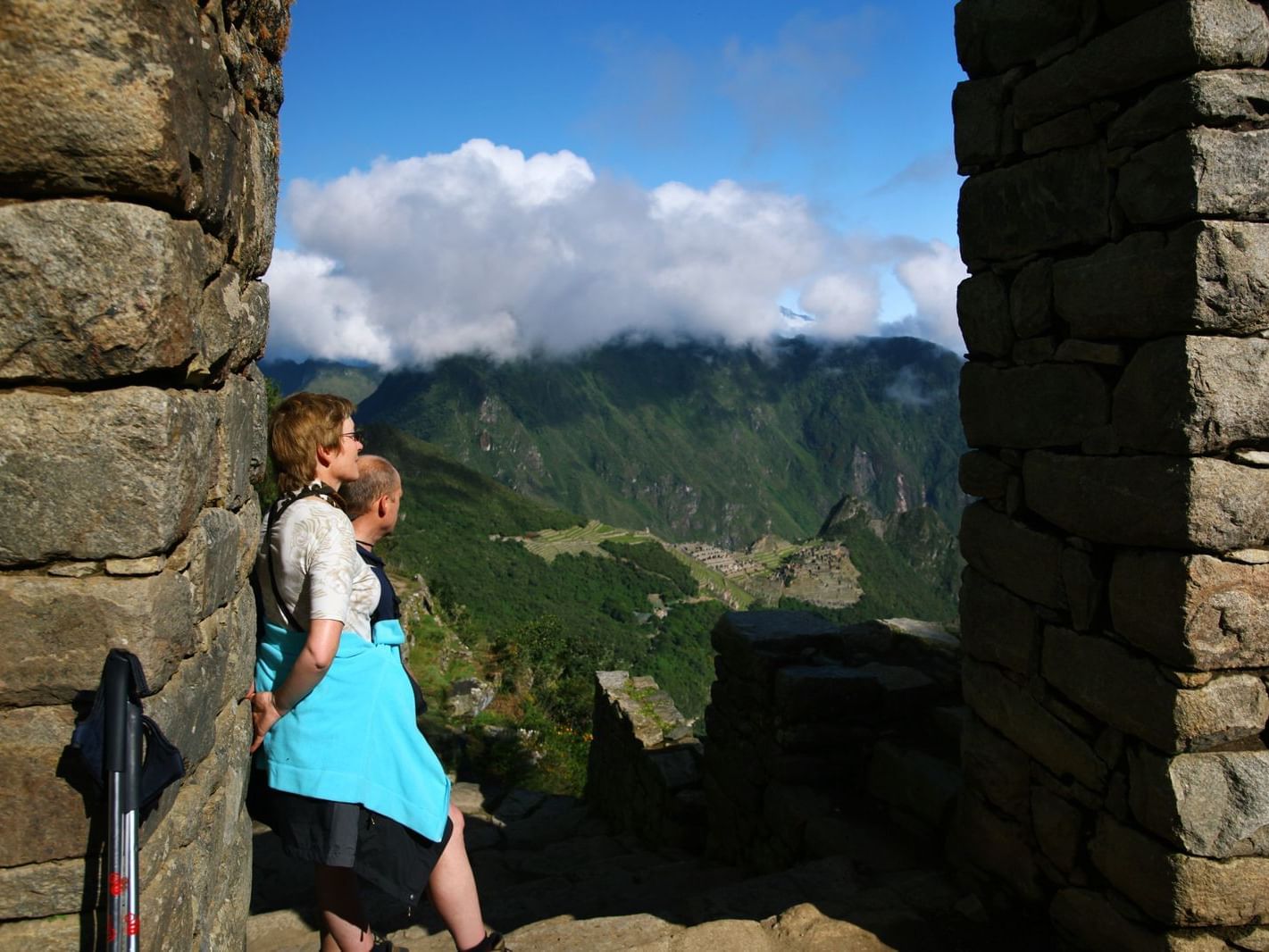 A couple admiring the view in The Sun Gate near Hotel Sumaq