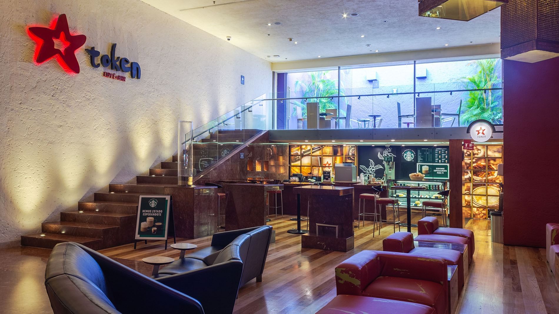 Token Café & Bar featuring a modern lounge area and stylish wooden staircase at Camino Real Polanco Mexico