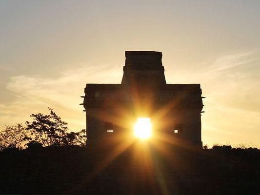 Exterior of Dzibilchaltún at sunset near Grand Fiesta Americana