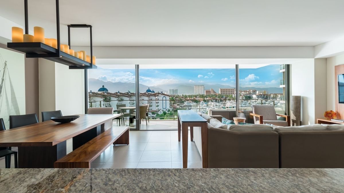 Dining area and living area in a room at Live Aqua Resorts