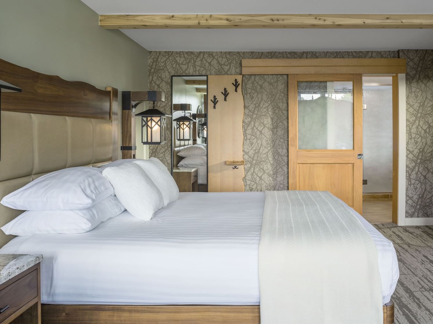 King bed in the Resort Suite Bedroom at High Peaks Resort
