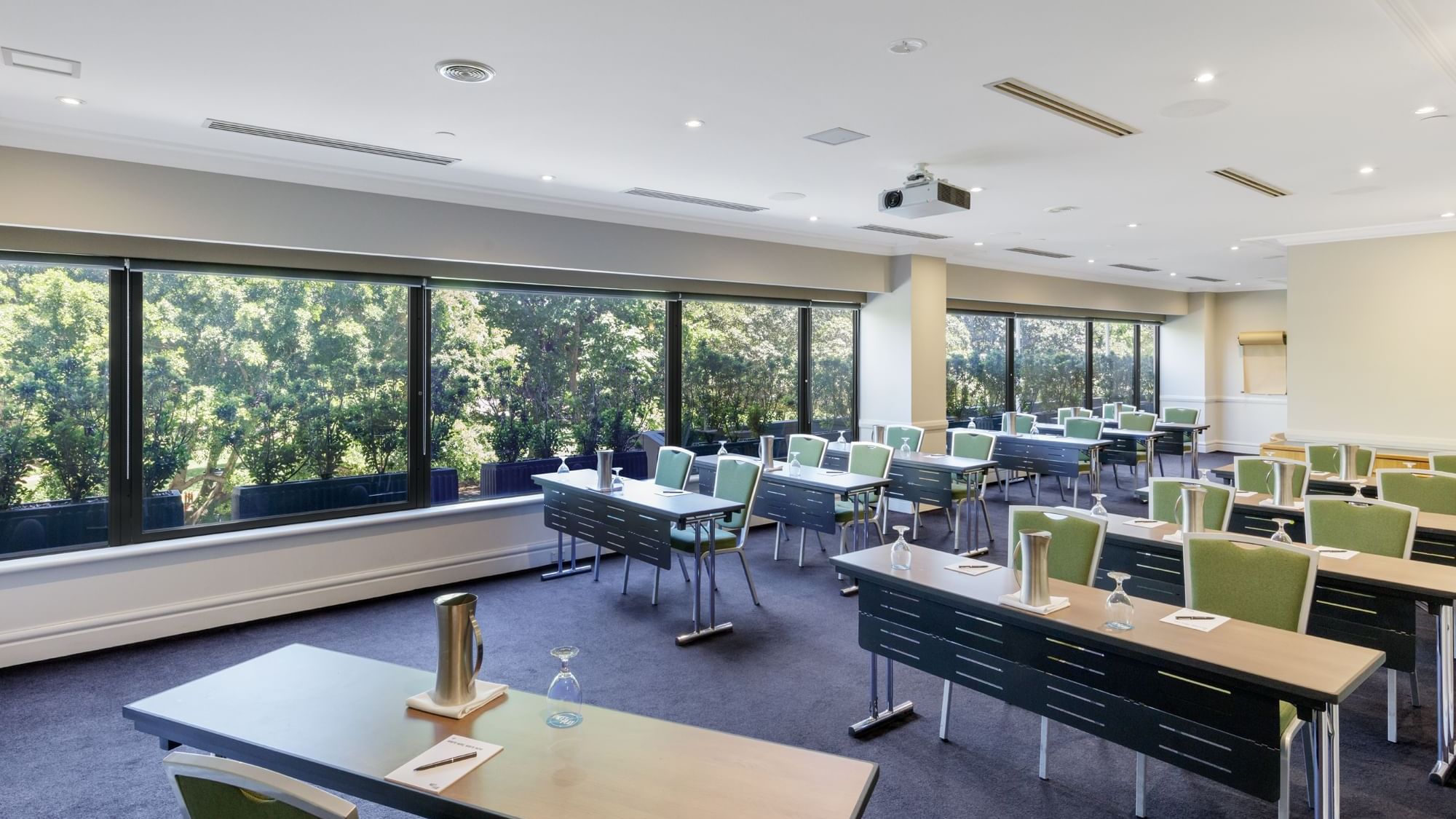 Classroom set-up in Parkview Room with carpeted floors at Pullman Sydney Hyde Park