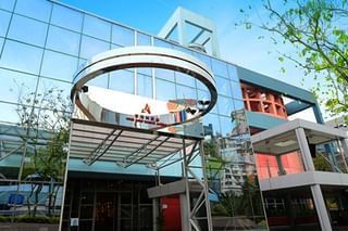 Exterior low angle view of Park Hotel Hong Kong entrance