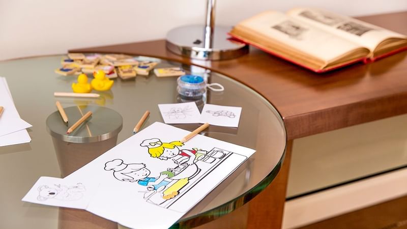 Kid painting in the family bedroom at Warwick Geneva