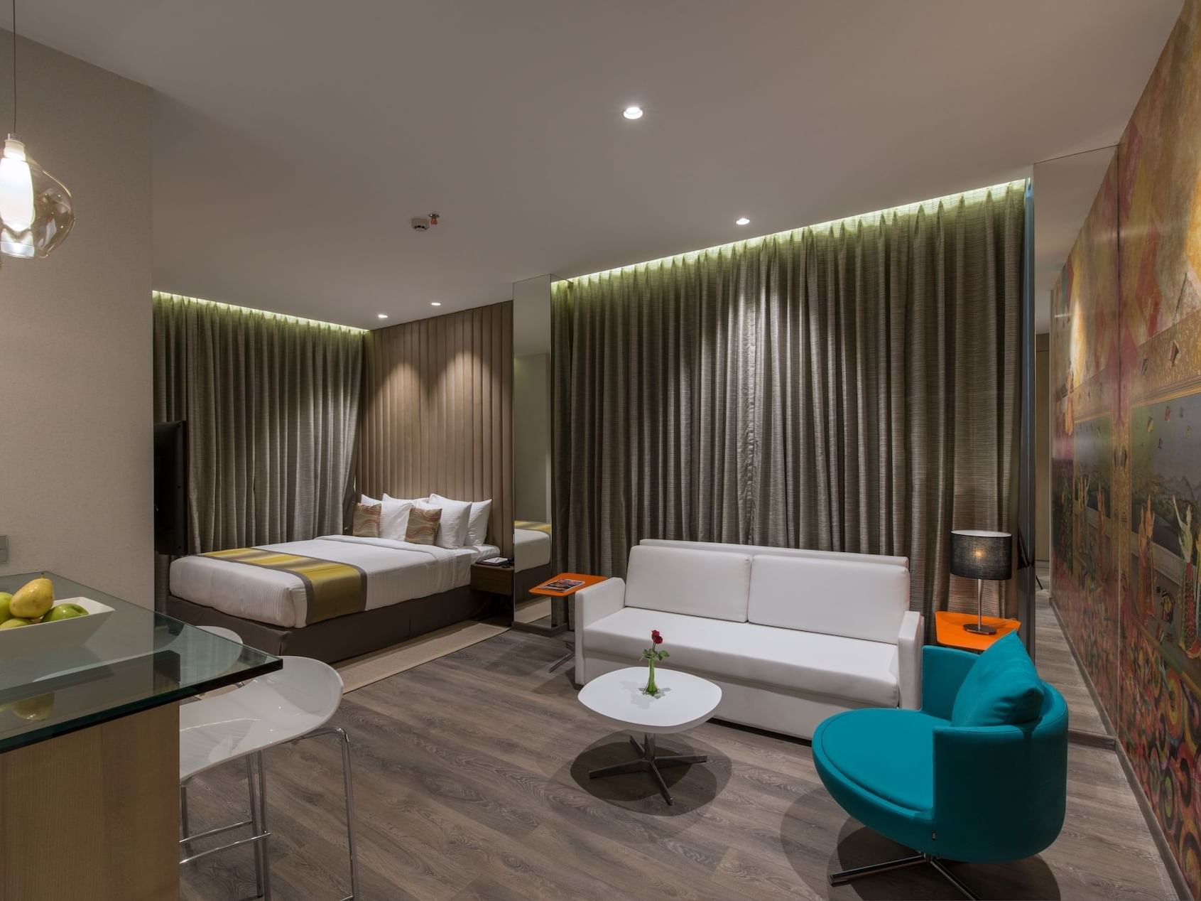 Living room & bedroom in Deluxe Studio Room at Eastin Hotels