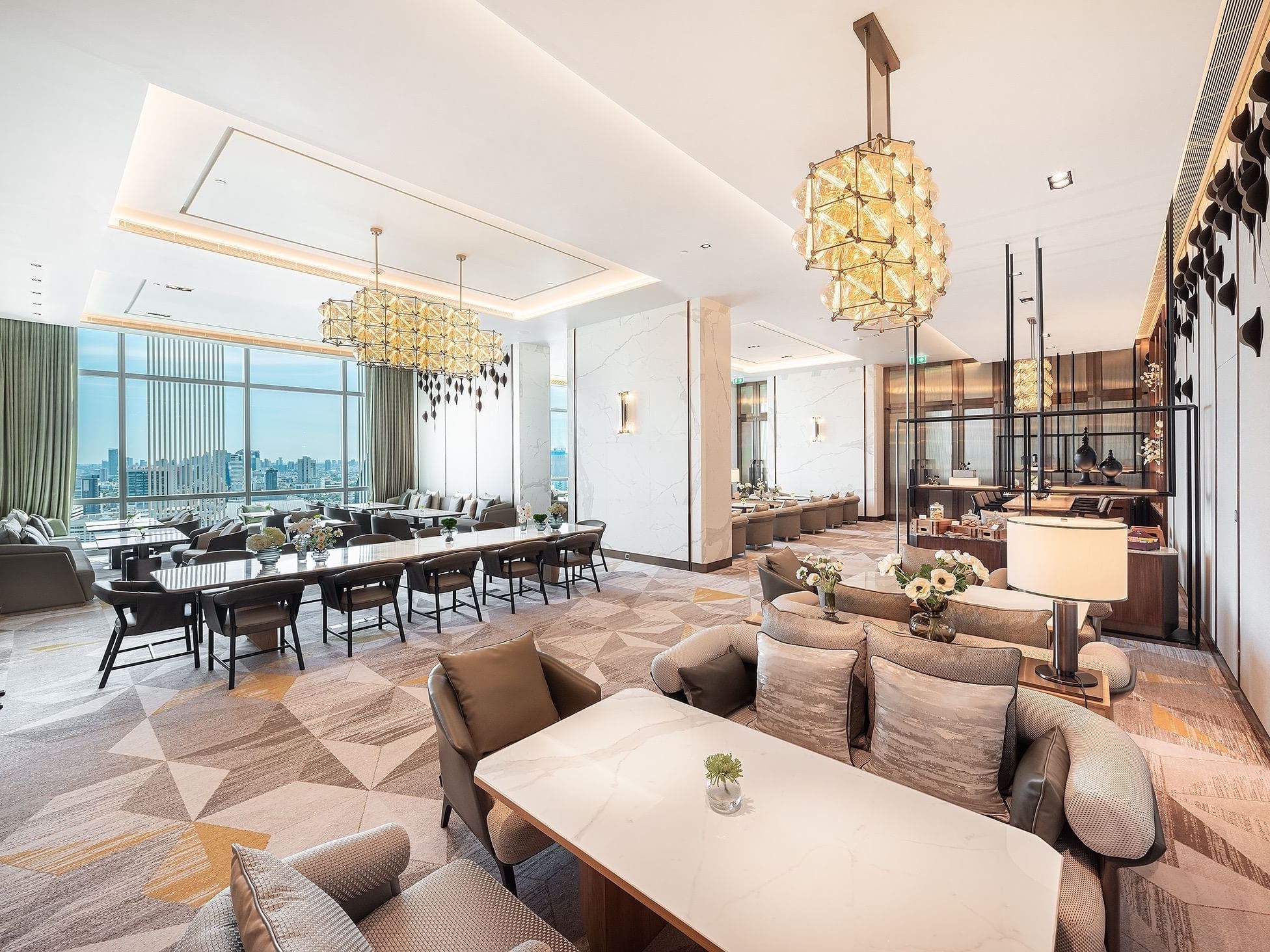 Chandeliers & comfy sofas set-up in the Executive Lounge at Eastin Grand Hotel Phayathai