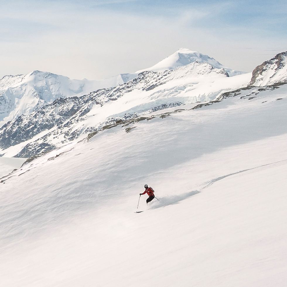 Distant view of a skier near Falkensteiner Hotels