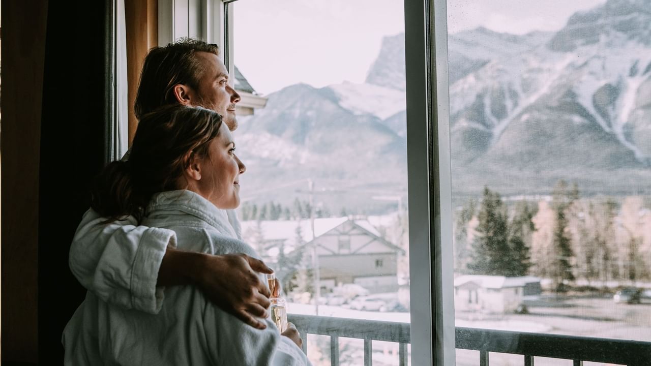 A couple in Canmore looking at mountains