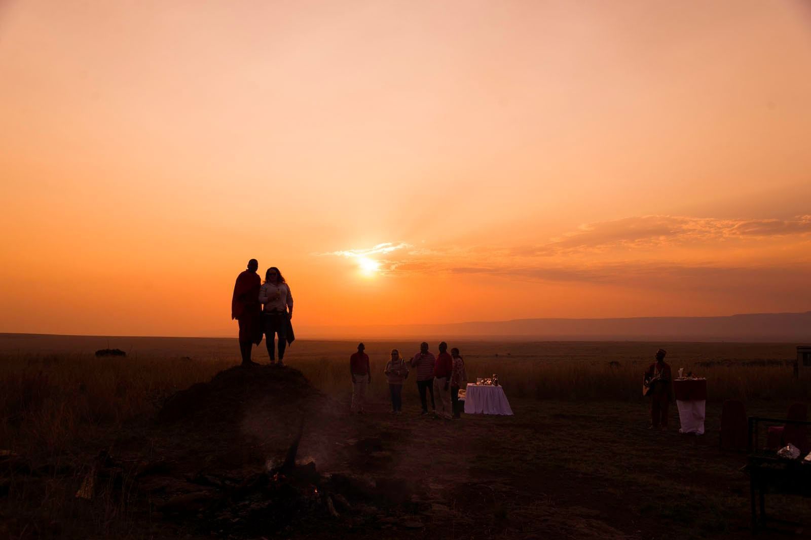 A couple looking at sunset in Mara Serena Safari Lodge
