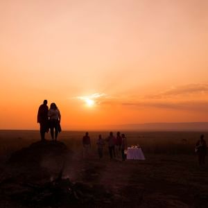A Couple Looking At Sunset In Mara Serena Safari Lodge