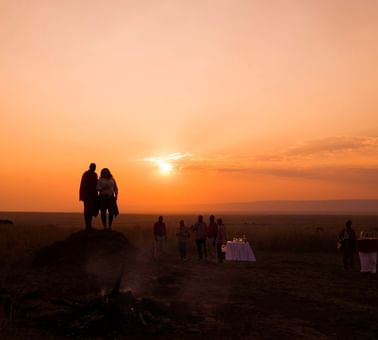 A Couple Looking At Sunset In Mara Serena Safari Lodge