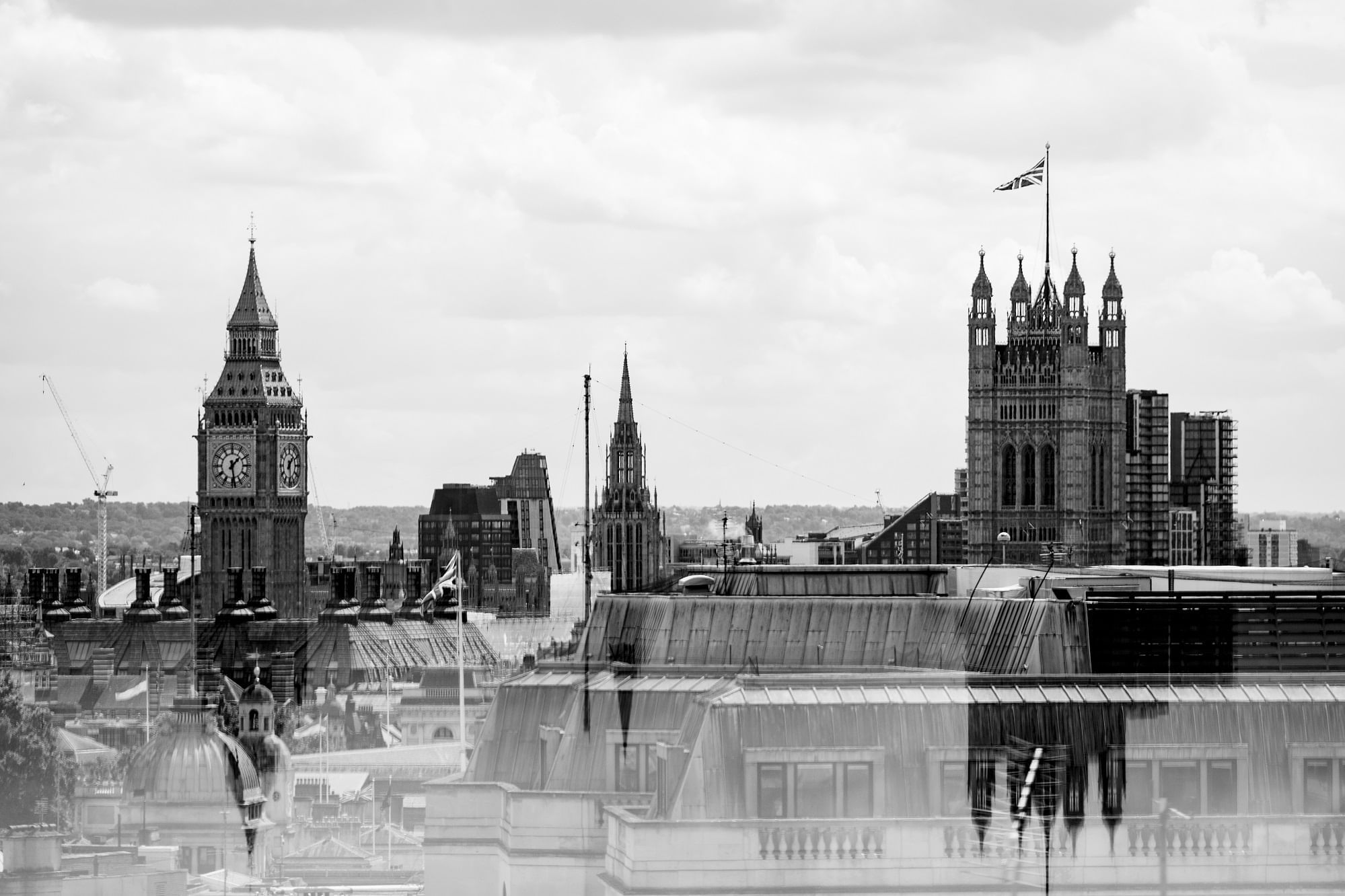 Black & white image of the old cityscape at The Londoner Hotel