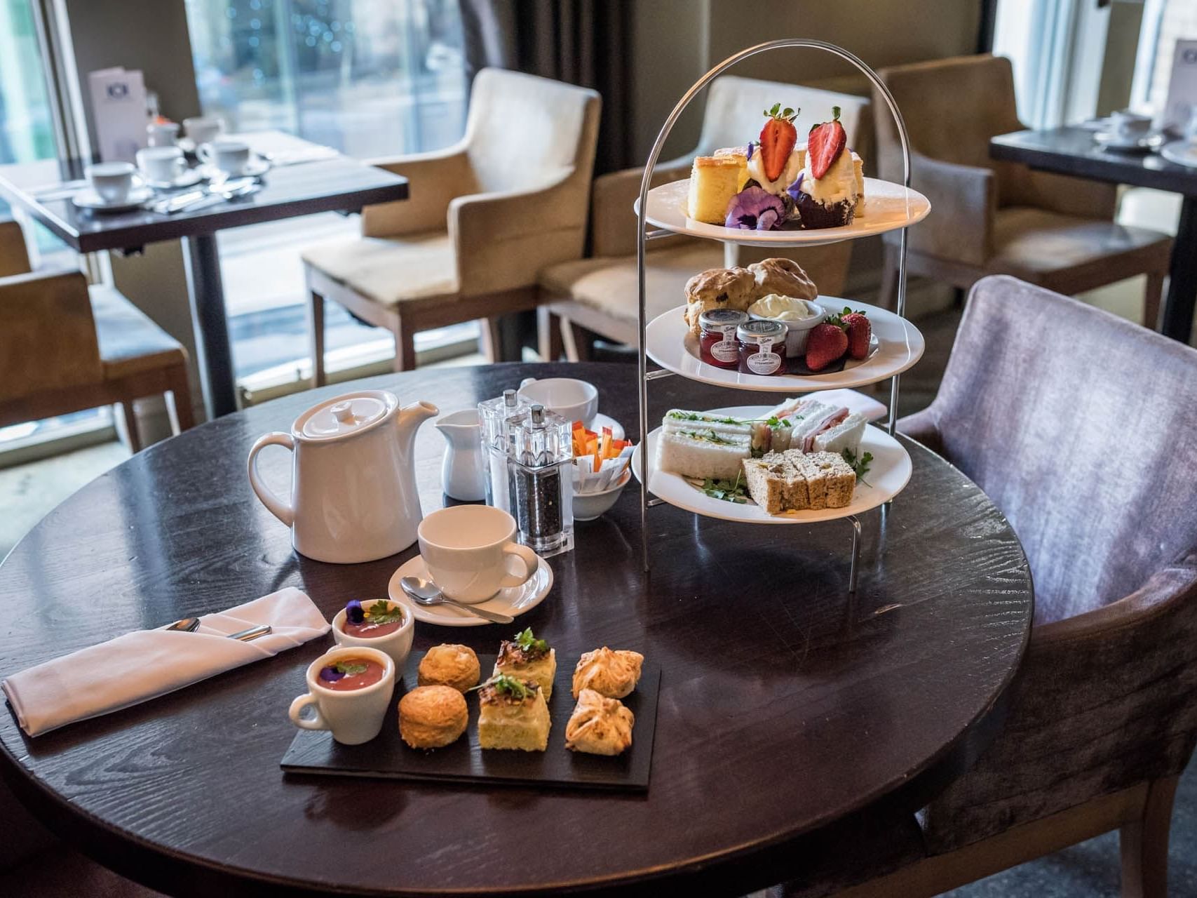 Coffee & cakes served on a table at Townhouse Hotel Manchester