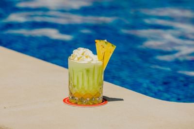 Drinks by the pool at The Magnolia Hotel