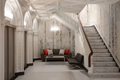 Godfrey Boston Lobby with view of stairs at The Godfrey Hotel