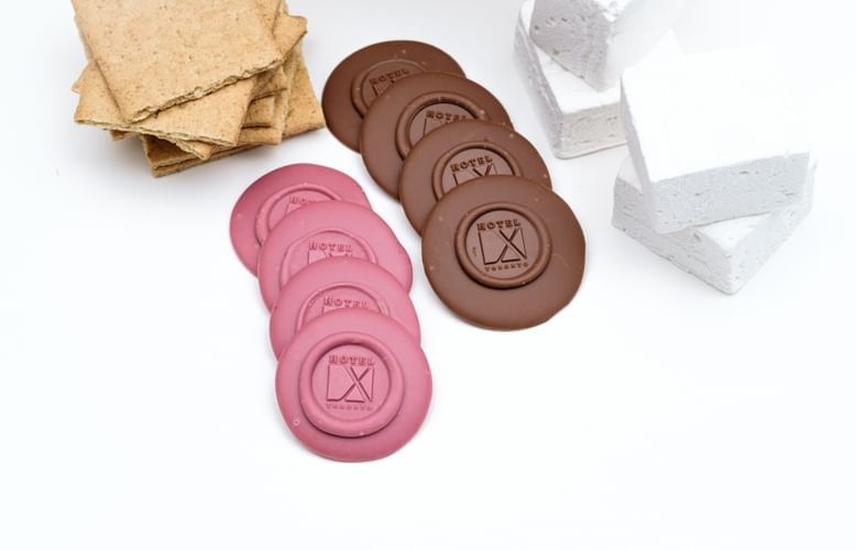 Ingredients for s'mores on a white surface at Hotel X, a downtown Toronto hotel