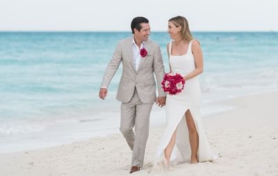 Wedding couple walking on the beach, The Somerset on Grace Bay