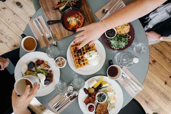 Breakfast plates on a table at Oliver Like Home