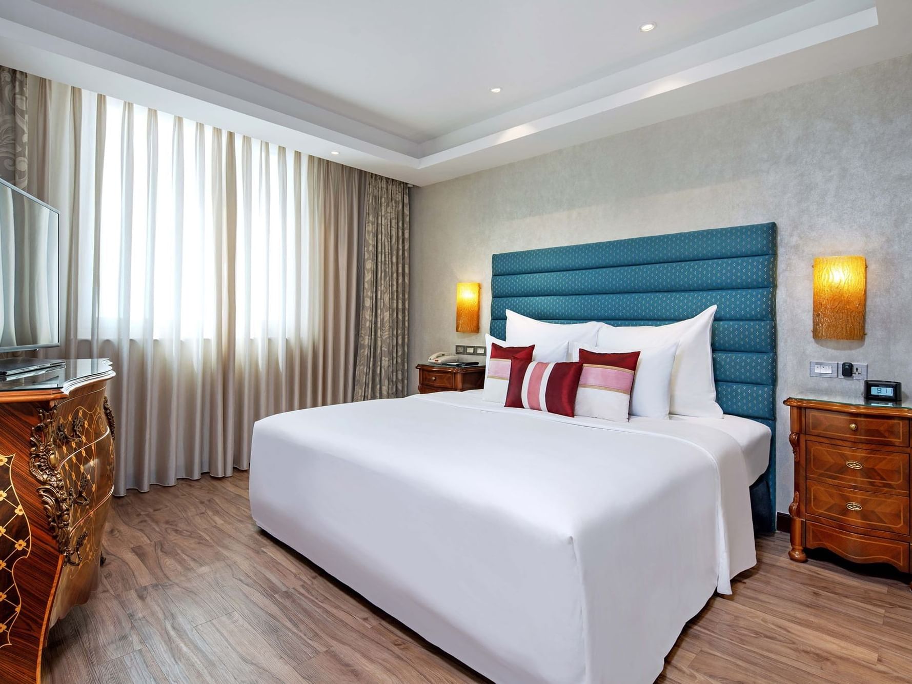 spacious hotel room with king beds