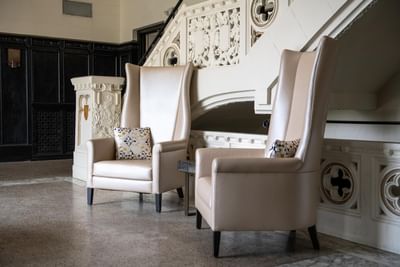 Comfy chairs in the lobby area at Castle Hotel and Spa