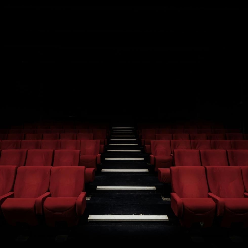 Empty red cinema seats and stairs for Bolzano Film Festival Bozen BFFB.
