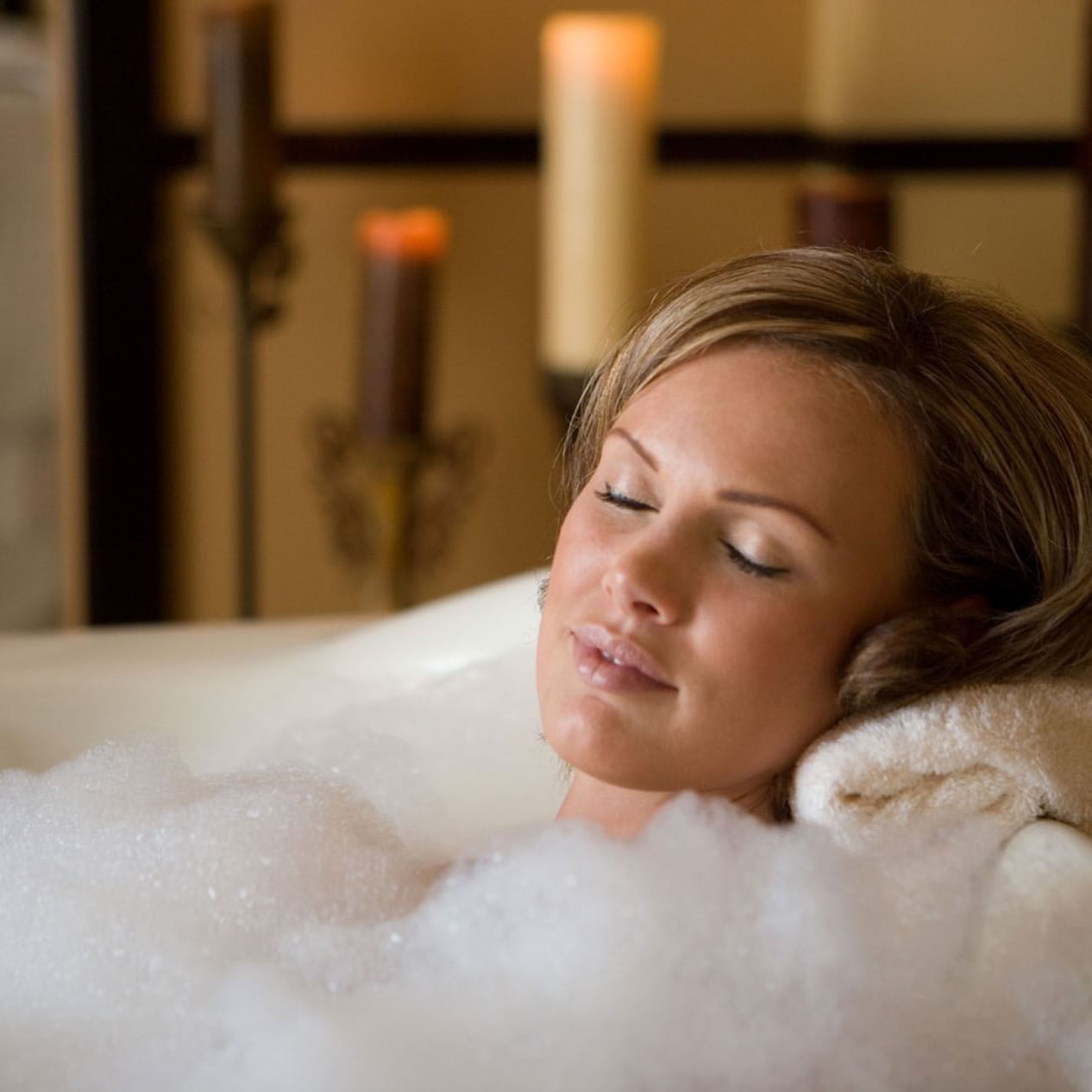 Lady having Caramel Marshmallow Body Scrub in Reflections Spa and Salon at Lake Buena Vista Resort Village & Spa