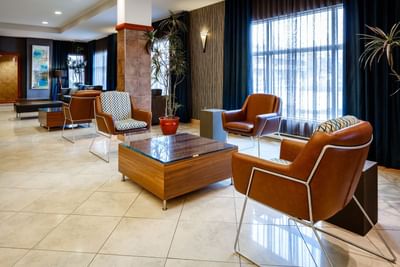 modern lobby of hotel with chairs and tables
