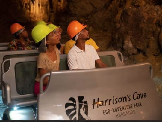 Harrisons Cave tour cart experience near Southern Palms Beach
