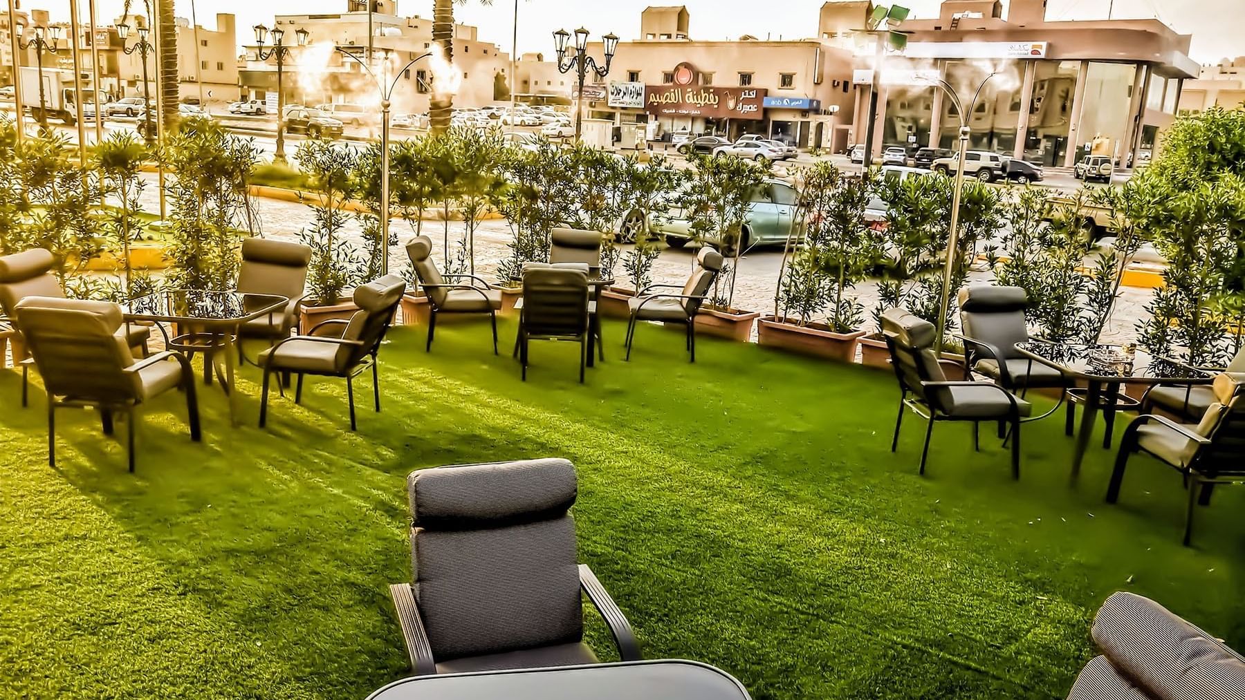 Outdoor dining area in Makeen Cafe at Makeen Homes by Warwick - Riyadh