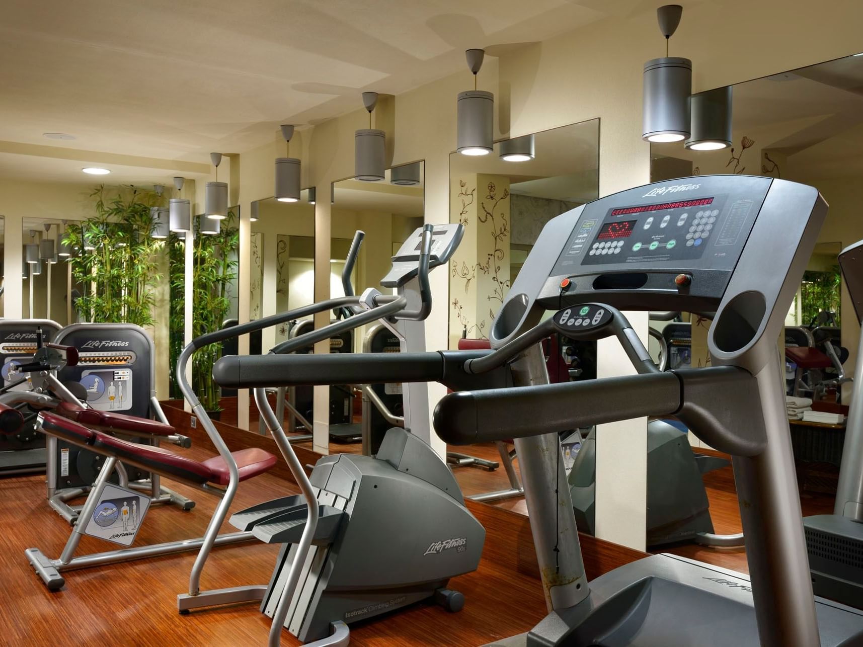Exercise machines in fitness center at Golf Hotel Punta Ala