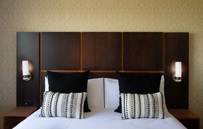 Presidential Suite's bed at NCED Hotel and Conference Center