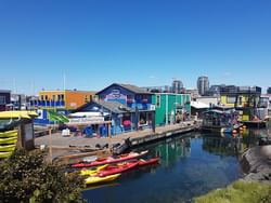 Waterway with boats parked at Fisherman's Wharf near Pendray Inn & Tea House