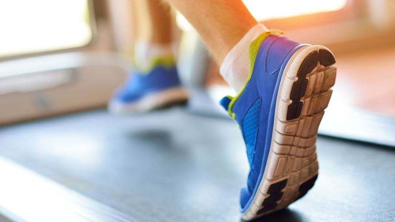 Close-up of a guy on the treadmill at Warwick Melrose Dallas