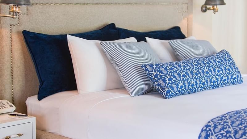 Closeup of bed in Efate Pool Villa at Warwick Le Lagon 