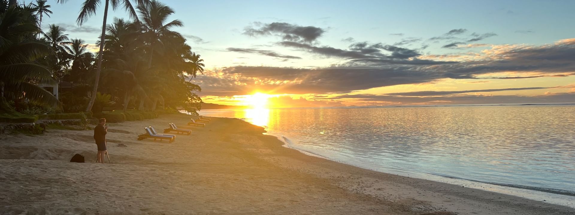 Sunset over a sand beach at Warwick Fiji Resort and Spa in Korolevu
