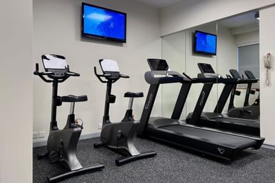 Maintain your fitness regimen at our Recreation Room equipped with exercise bike, treadmill and dumbbells