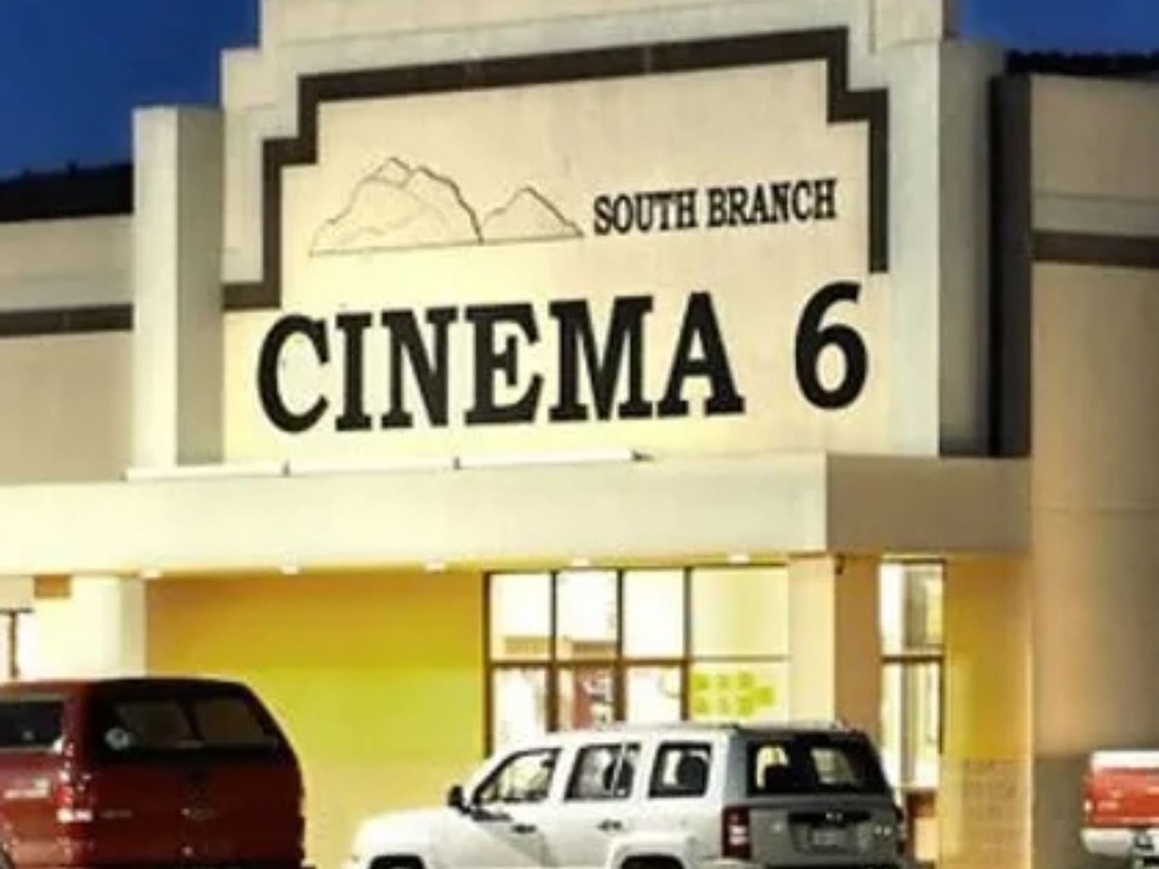 South Branch Cinema 6 exterior with a car park near South Branch Inn Romney