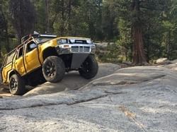 1990 Toyota 4Runner attempting to crawl over Silby Rock by Dsilby / CC BY-SA 3.0 via Wikimedia Commons