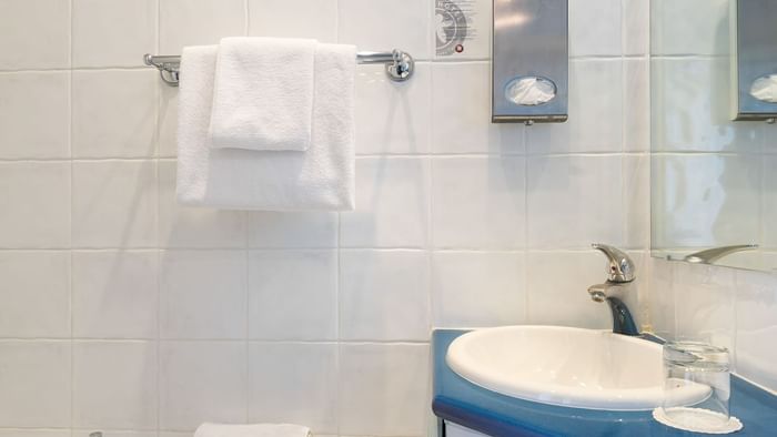 Bathroom vanity in bedrooms at Hotel des Orangers