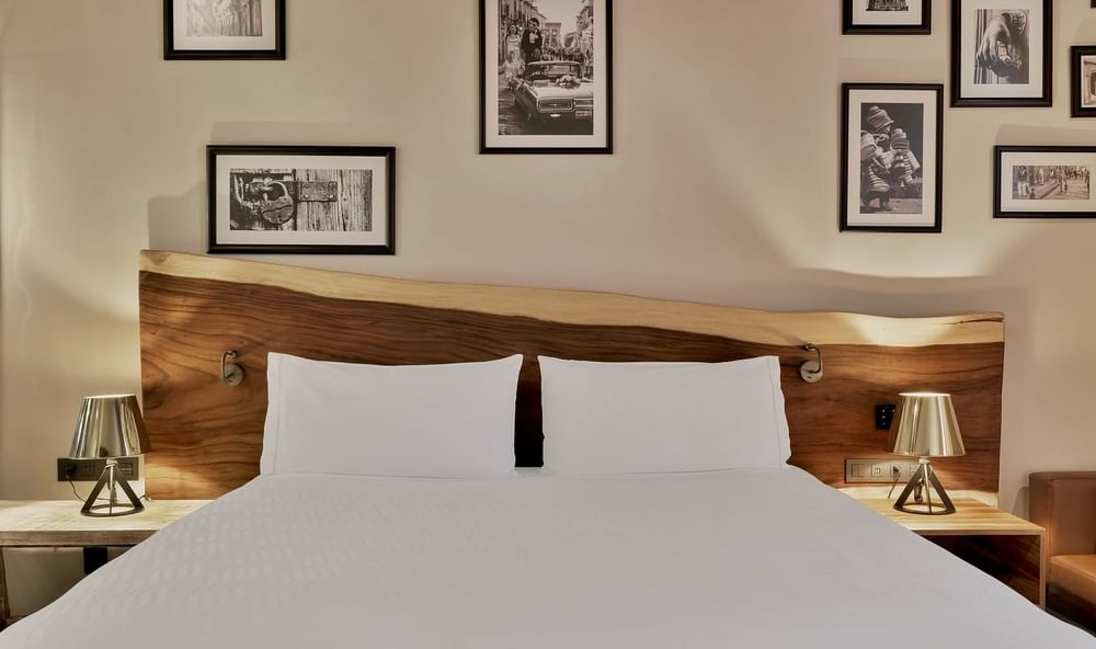 King bed and nightstands in Deluxe Room at Live Aqua San Miguel De Allende