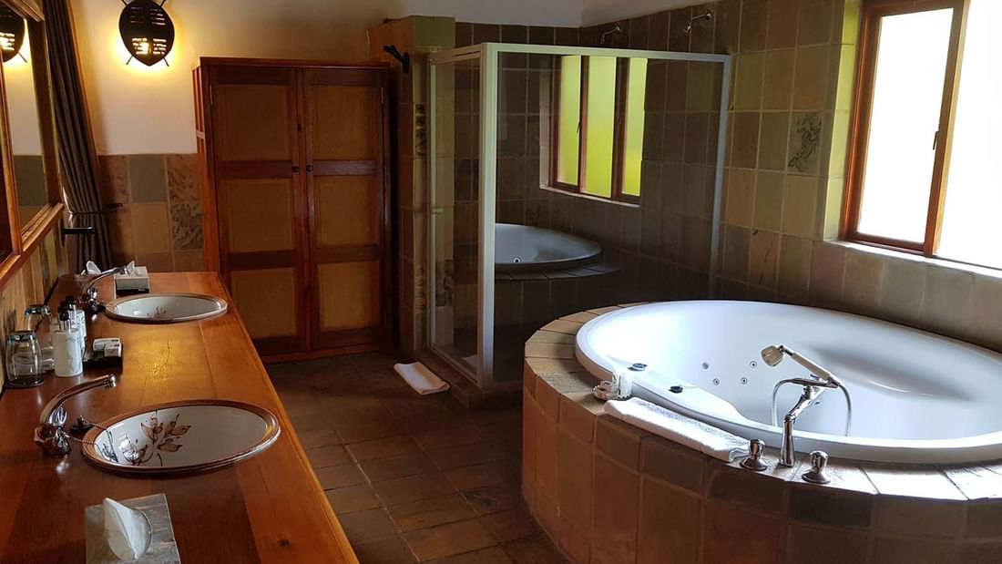 Bathroom with amenities in Royal Suite at Misty Hills Country Hotel