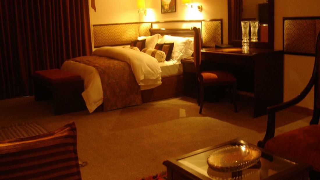 Bed & furniture in Standard Room at Khorog Serena Inn Hotel