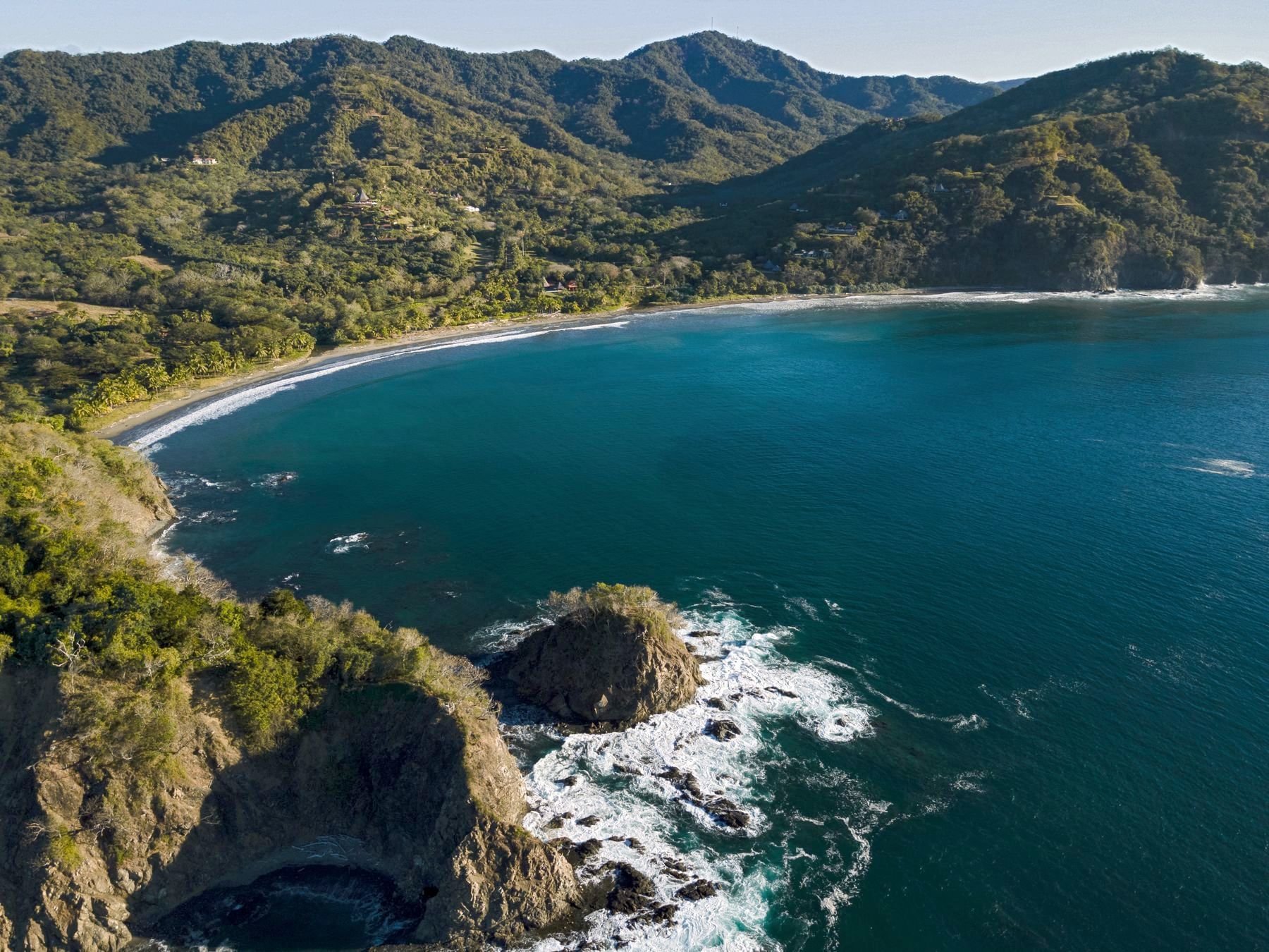 Top view of Mountains surrounding the sea at Punta Islita Hotel