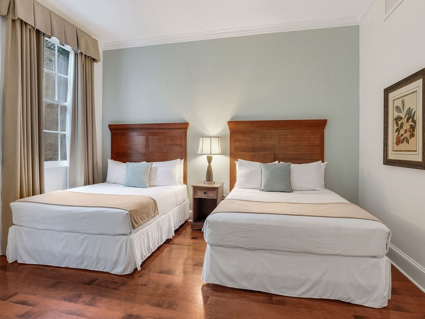 Traditional Two Queen Bed Room with two beds at St. James Hotel