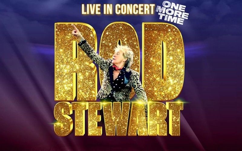 Rod Stewart in front of a glittering gold name sign with the text “Live in Concert – One More Time”.