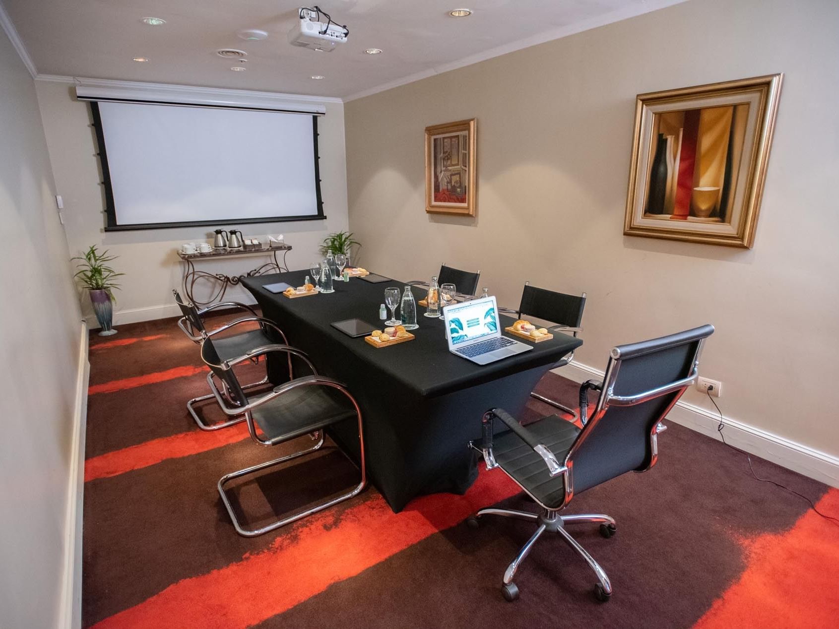 Boardroom table & screen in Petit Salon at Grand Hotels Lux