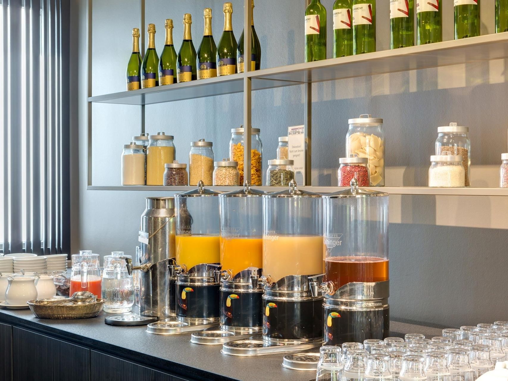 Delicious breakfast spread with coffee, fresh juices at Hotel Sylter Hof Berlin
