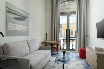 Couch and window in hotel living room